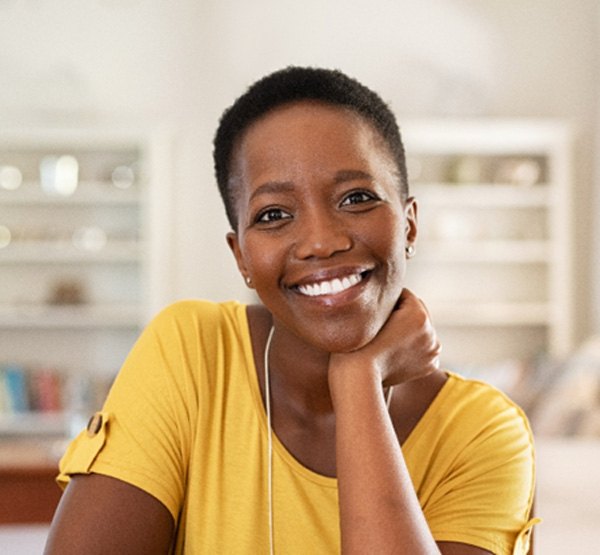 Woman with dentures in Dudley smiling