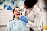 Woman smiling during dental checkup