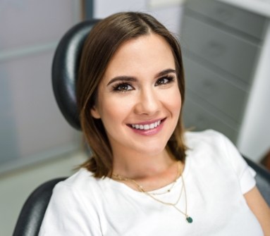 Woman smiling during preventive dentistry visit