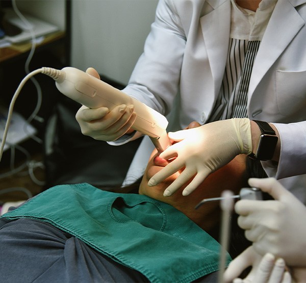 Dentist capturing digital bite impressions