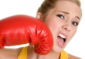 a woman with a boxing glove