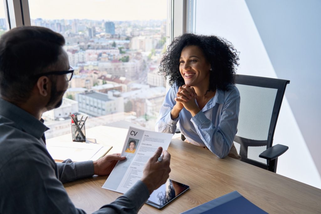 Woman smiling during job interview