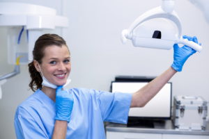 a dental hygienist smiling 